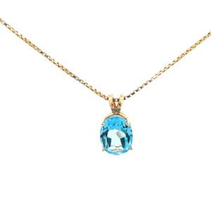 14k Gold Necklace Set with a Blue Topaz Charm